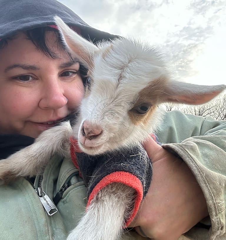 Mandi Sawyer with Garth the goat
