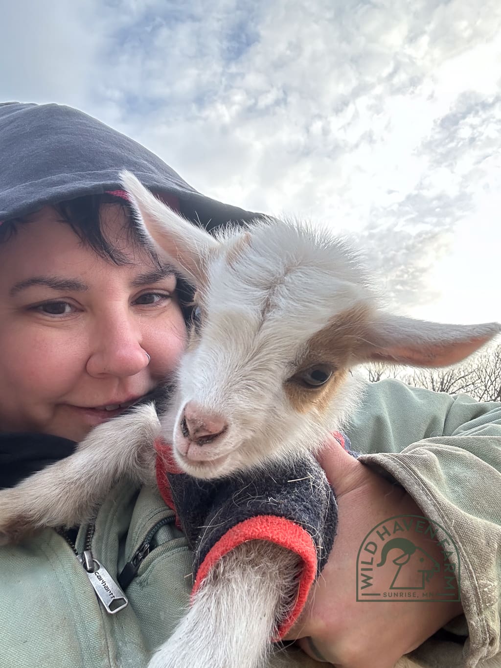 Mandi with Garth the goat at Wild Haven Farm